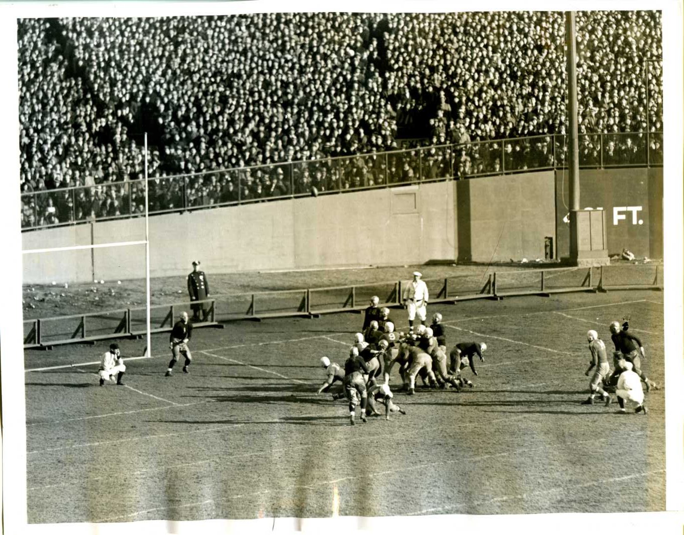 Sal Somma kicking the winning extra point in New York University’s 1936 upset of Fordham’s “Seven Blocks of Granite,” at Yankee Stadium.